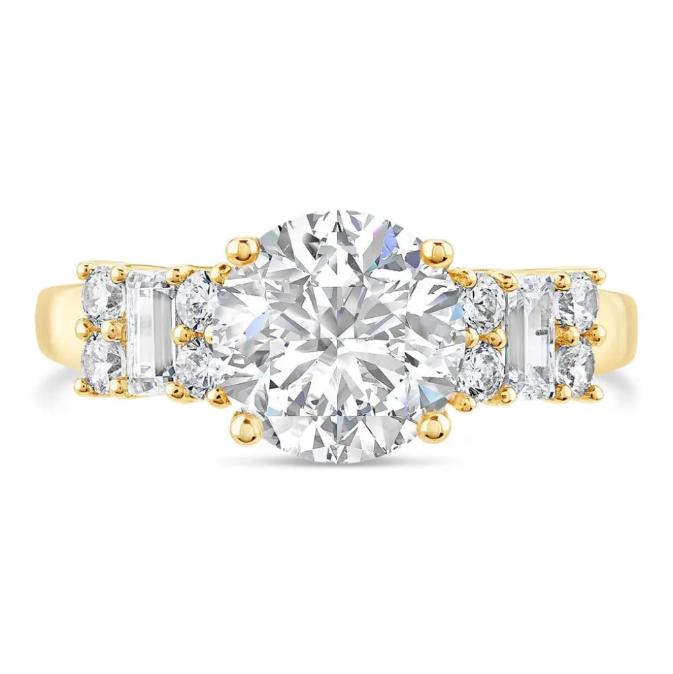 9ct Gold Round Brilliant and Baguette Cubic Zirconia Ring