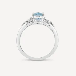 9ct White Gold Oval Blue Topaz Centre 0.14ct Diamond Trefoil Sides Ring