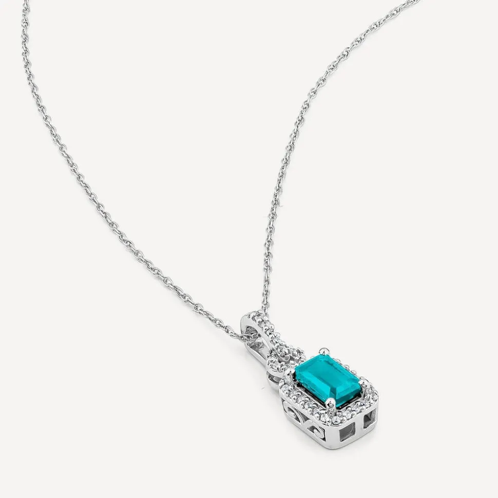 9ct White Gold Rectangular Blue Topaz & 0.10ct Diamond Halo Pendant