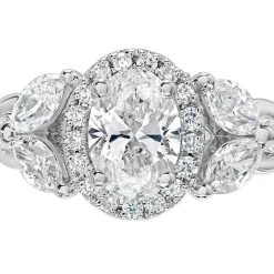 Kathy De Stafford 18ct White Gold ''Layla'' Oval Halo With Side Stone 0.75ct Ring