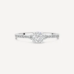 Northern Star 0.75ct Diamond Round Brilliant Small Pear Sides & Shoulders Platinum Ring
