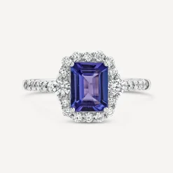Platinum Emerald Cut Tanzanite Centre Diamond Halo & Shoulders Ring